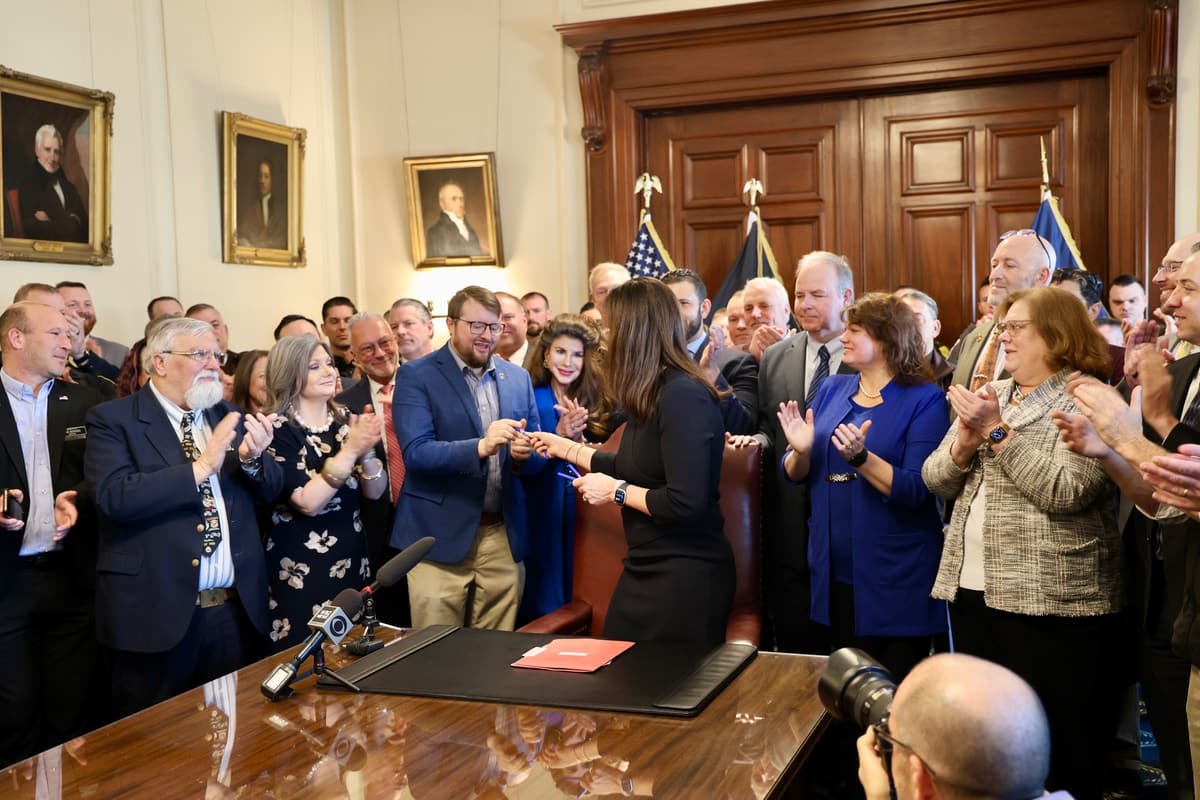 Bill signing ceremony at the State House